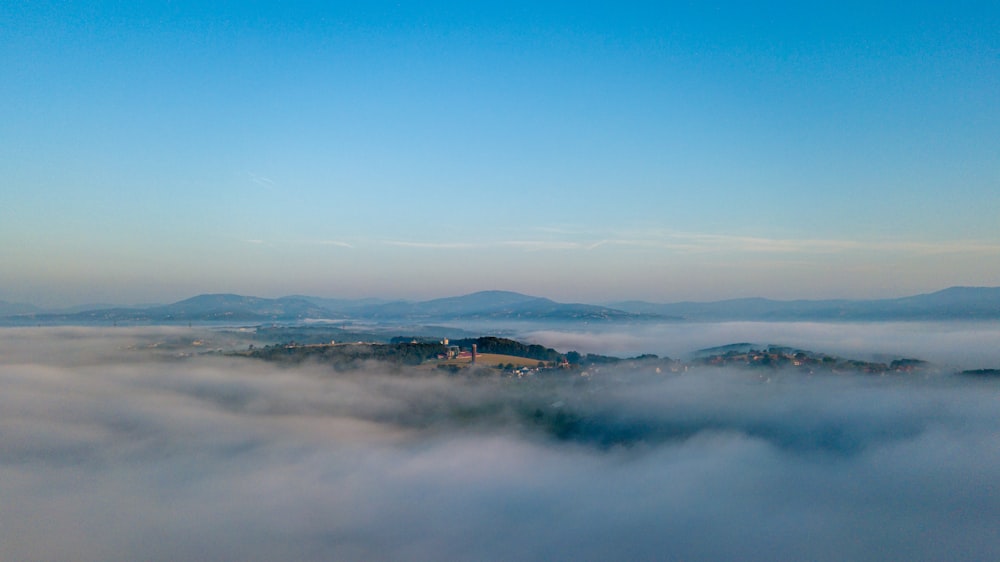 clouds and city at the distance during day