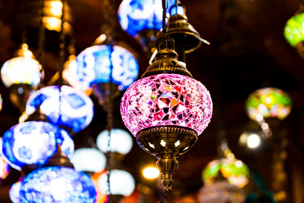 shallow focus photo of purple pendant lamp