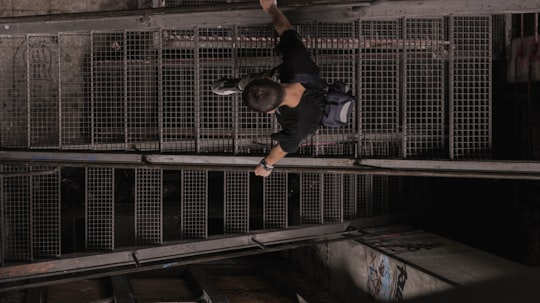 man going down on stairs in Munich Germany