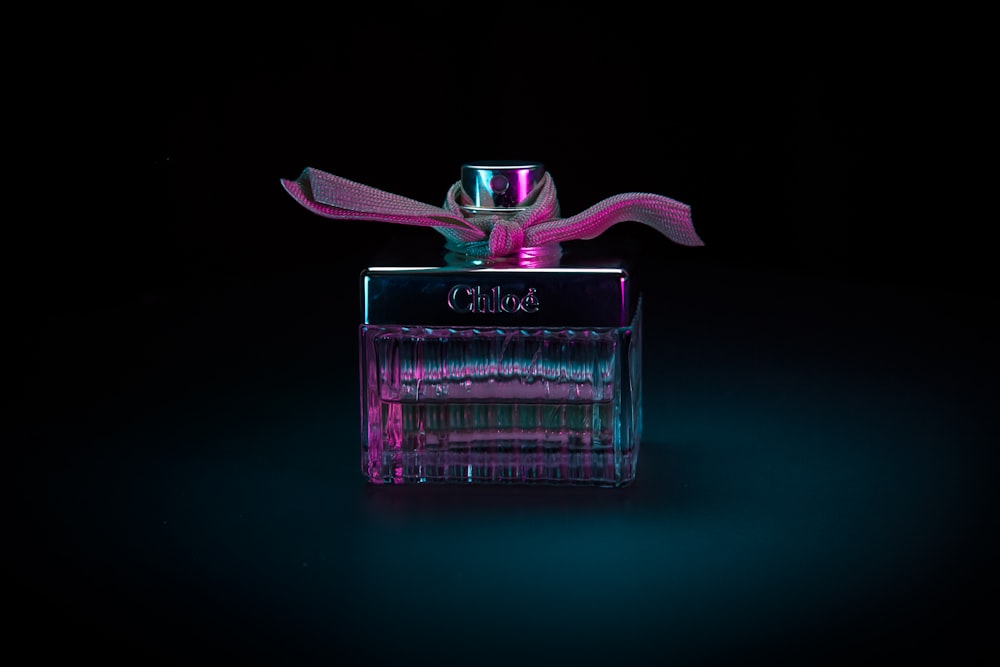 purple glass perfume bottle