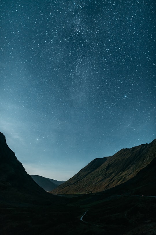 stars over mountains during daytime in Glencoe United Kingdom