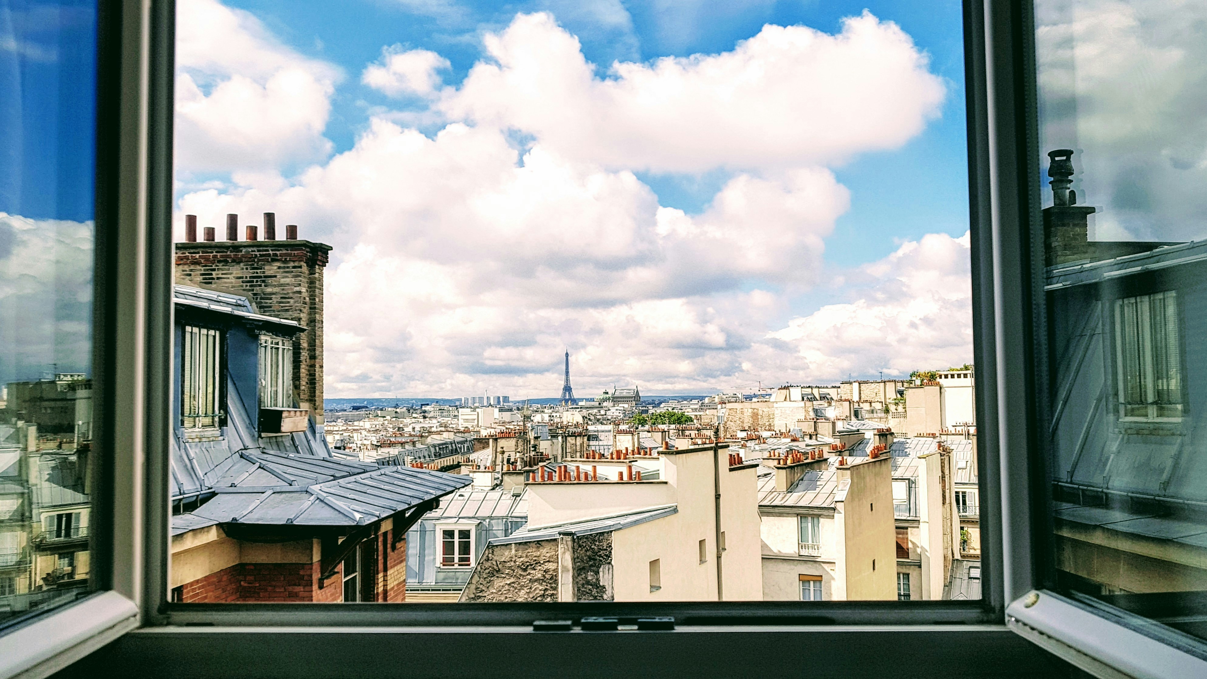 A picture taken from the window of my little apartment on Rue la Fayette in downtown Paris. My wife and I had just arrived and I snapped a picture before we passed out on the bed underneath the window.