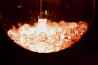 Close-up of glowing nanoparticles under a microscope in a laboratory setting