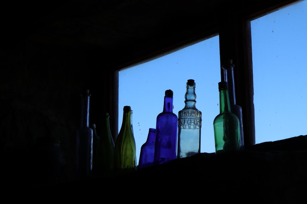 several bottles on window
