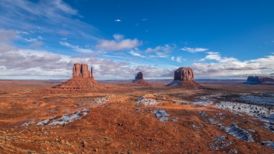 brown mountains during daytime in Monument Valley United States