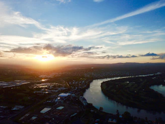 Close-up of river curves reflecting the soft glow of sunset.