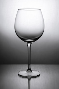 grayscale photo of wine glass