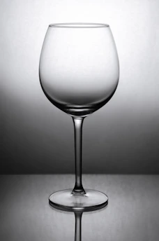 grayscale photo of wine glass