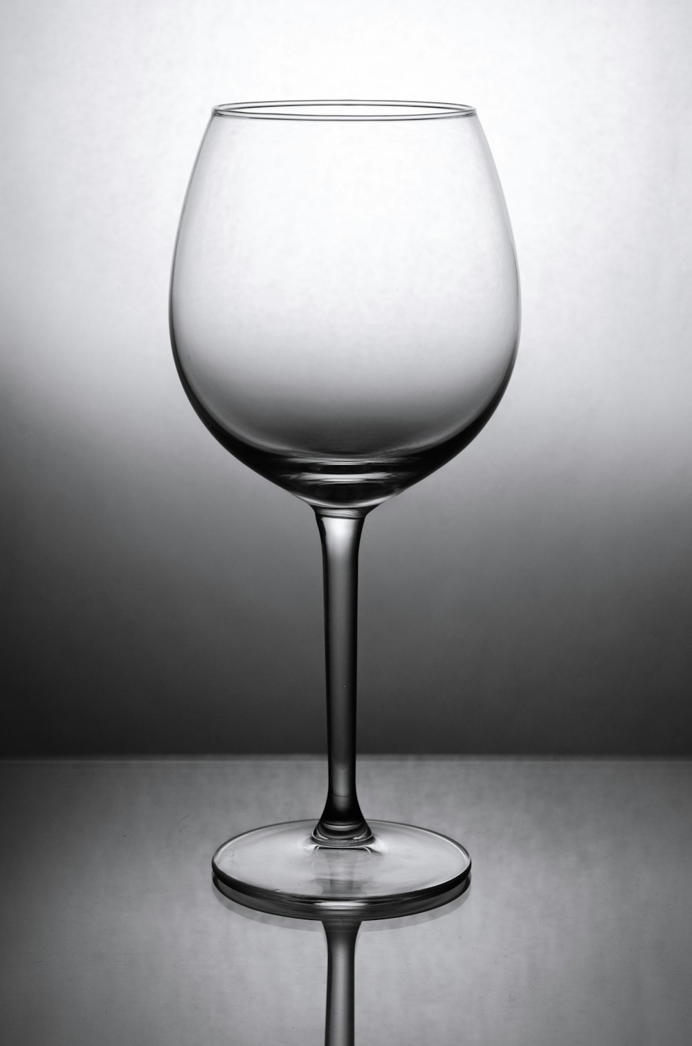 grayscale photo of wine glass