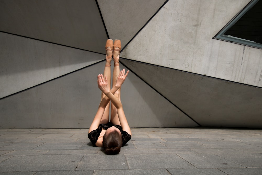 woman laying down on floor