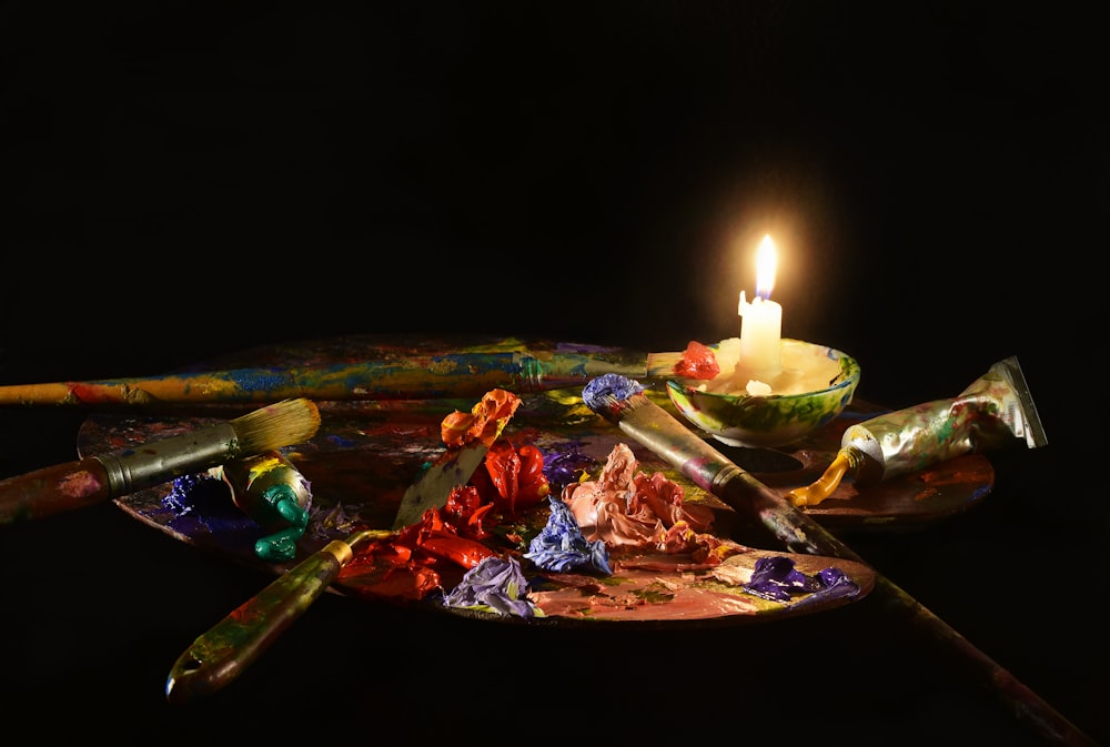 paint palette with candle