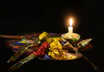 mixed paint on palette with candle