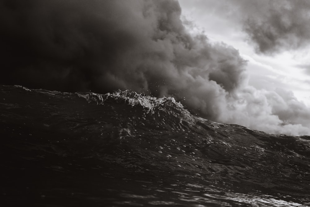 grayscale photo of beach waves