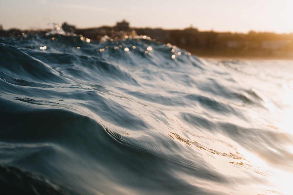 sea waves during sunset