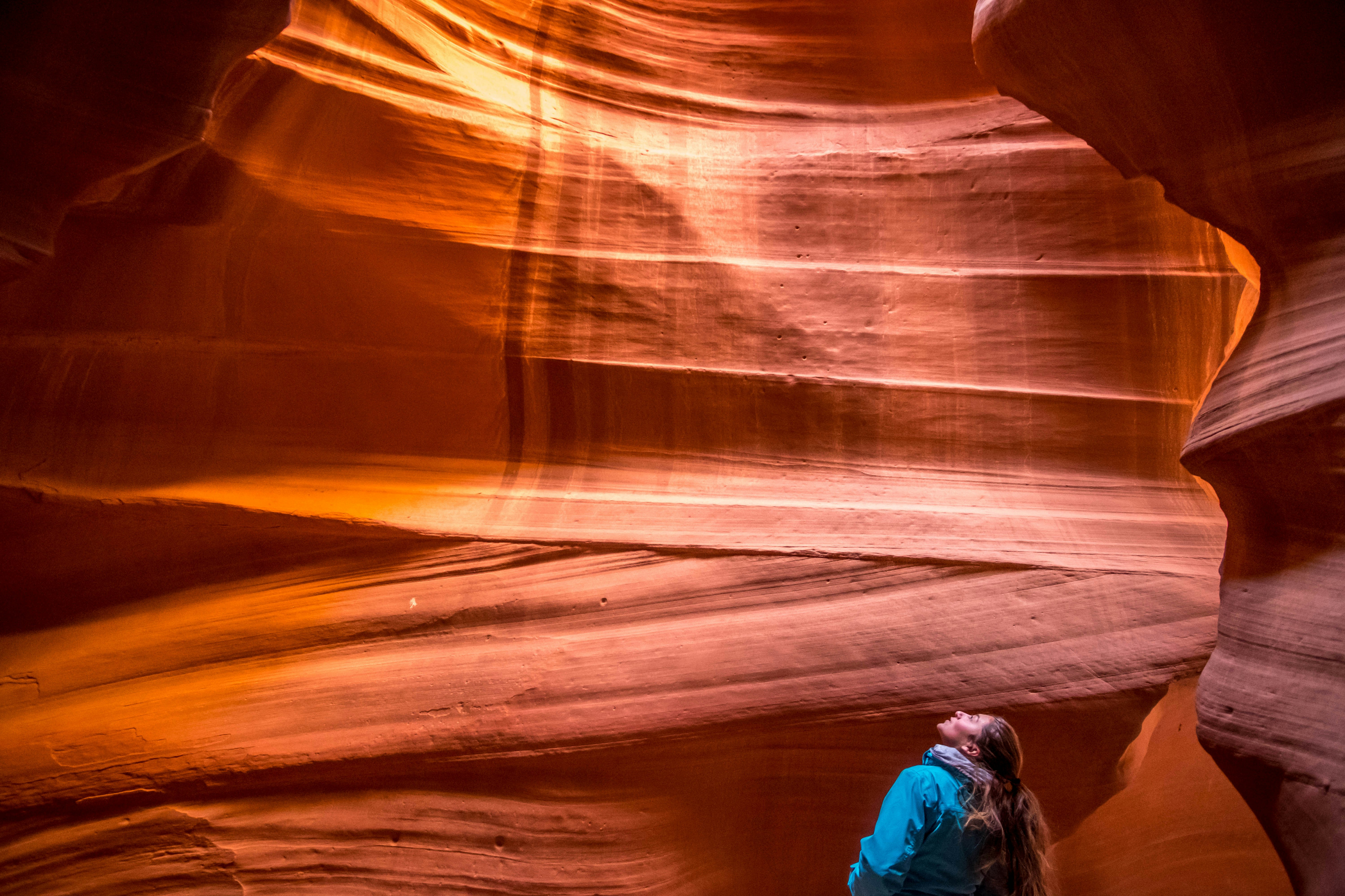 Navajo guide leading photography group through Upper Antelope Canyon, Page Arizona