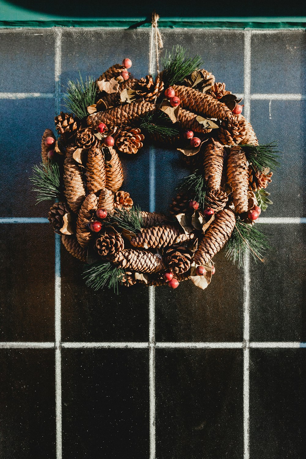 hanging green, red, and green wreath