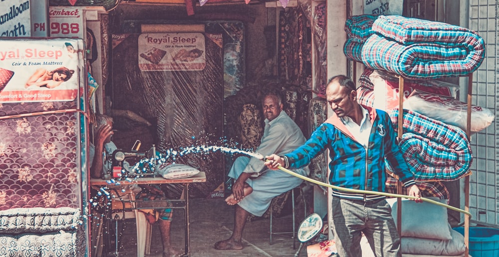 man holding hose