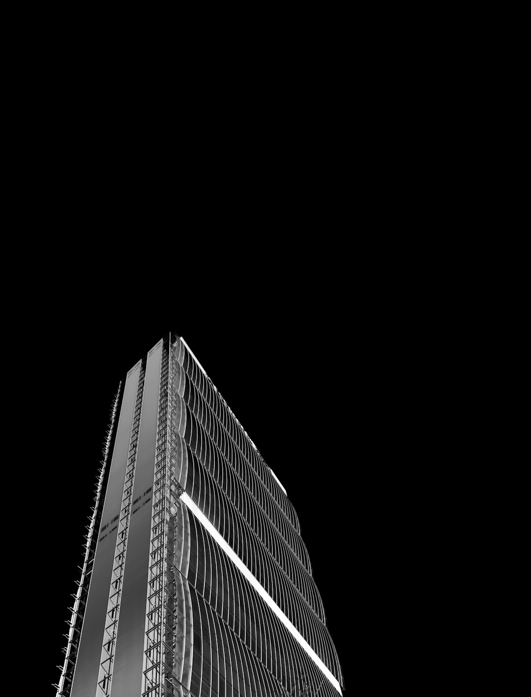 grayscale photo of high-rise building