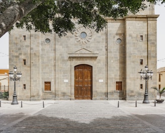 photo of brown concrete church