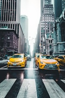 several car between of skycraper