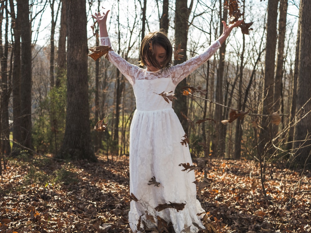 woman raising her hands