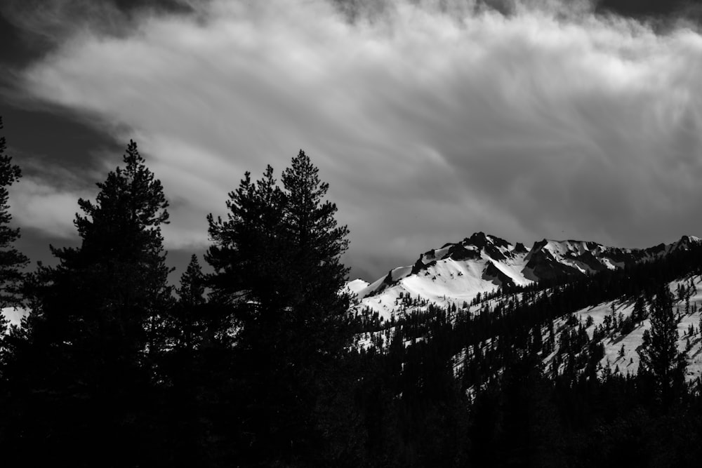 grayscale photo of mountain covered with snow