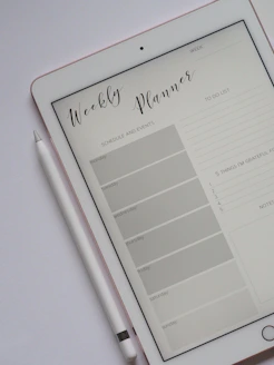 Close-up of a minimalist study planner PDF displayed on a tablet with a clean, modern background.