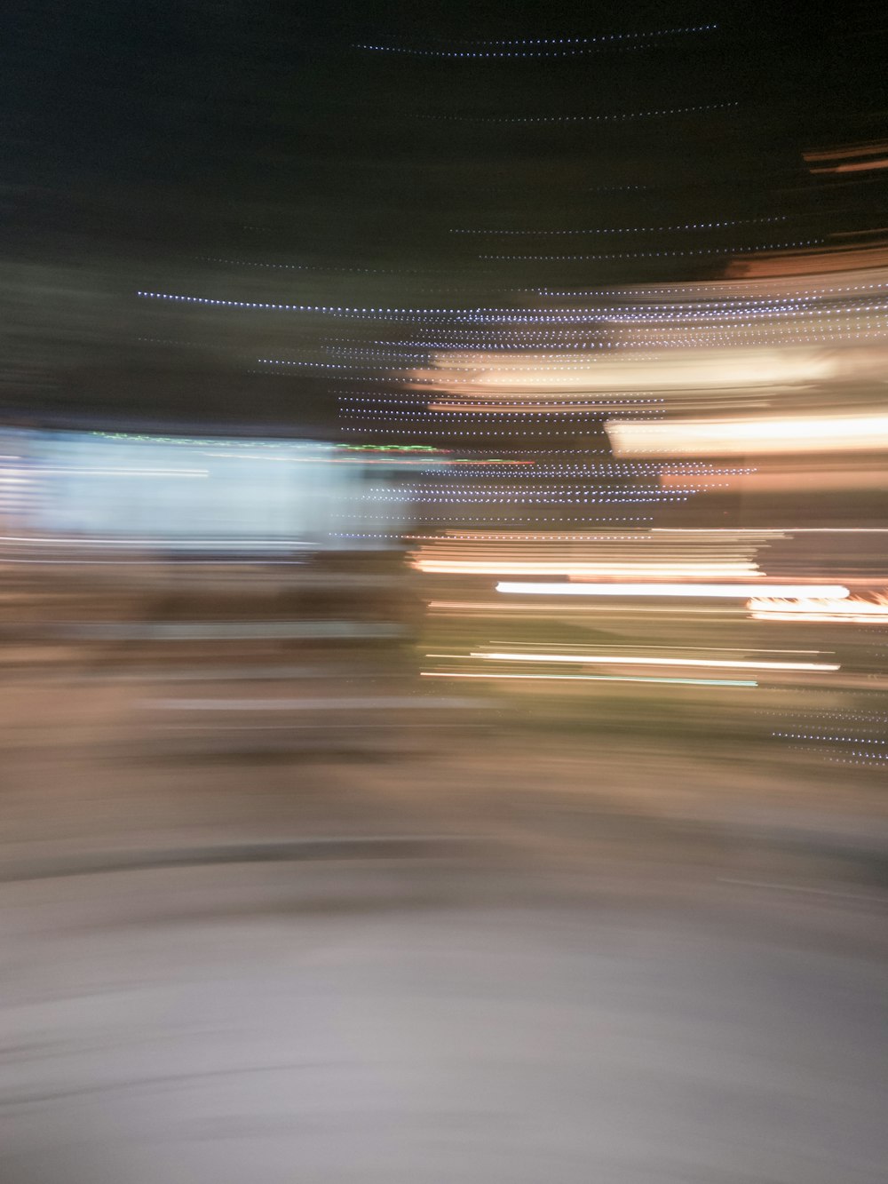 a blurry photo of a person riding a skateboard