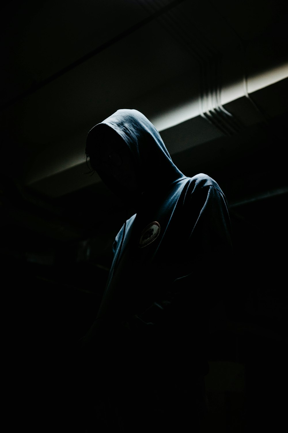 person in black hoodie