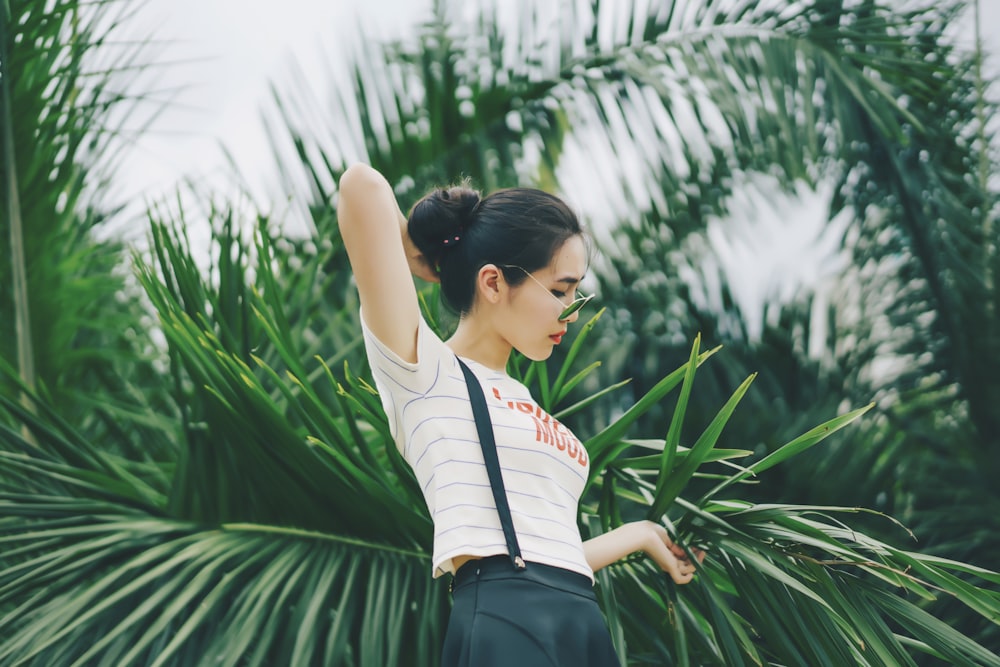 woman fixing her hair