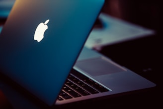 MacBook Pro on black surface