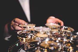 person standing beside martini glasses