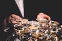 person standing beside martini glasses