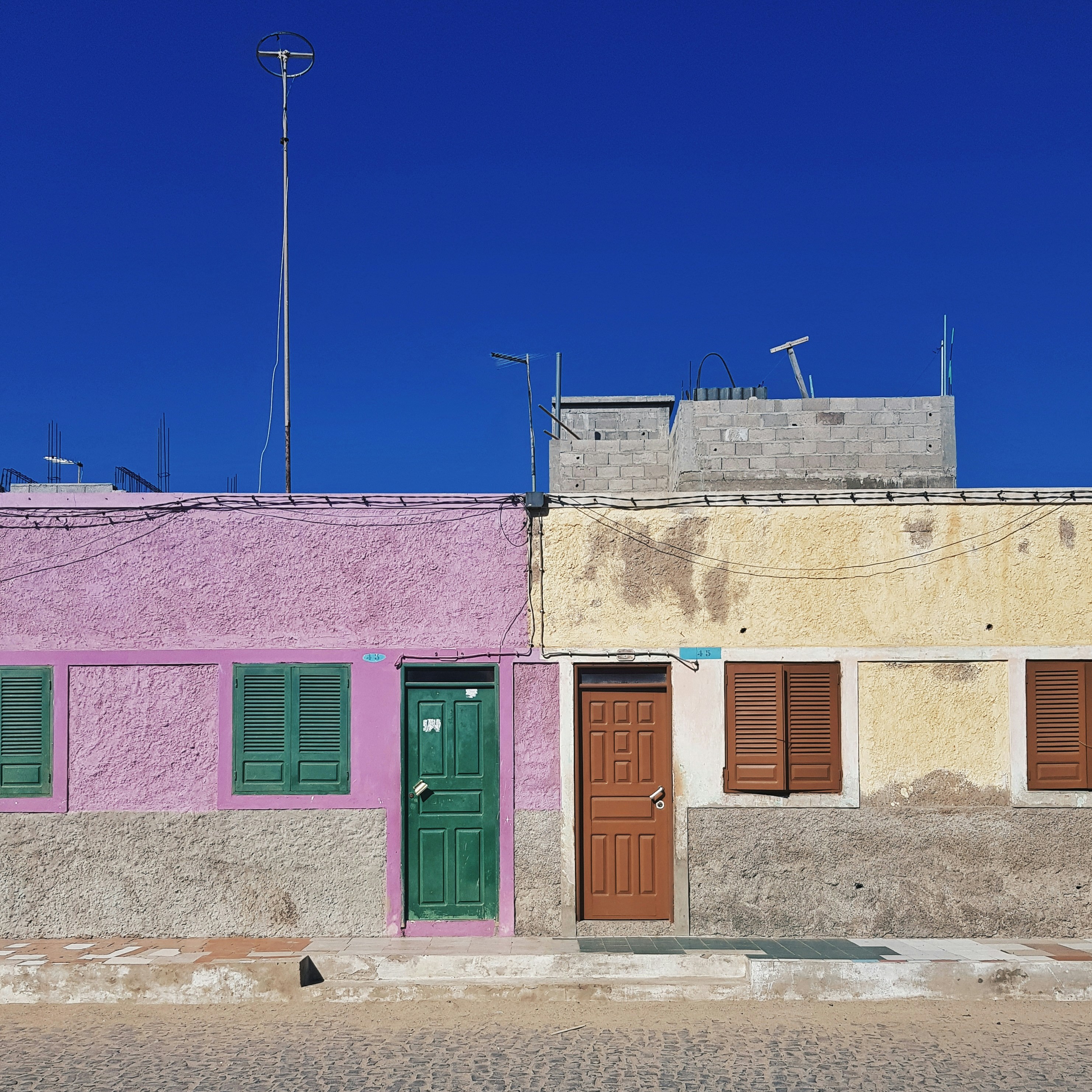 Colorful houses in downtown Santa Maria on Sale, Cape Verde.