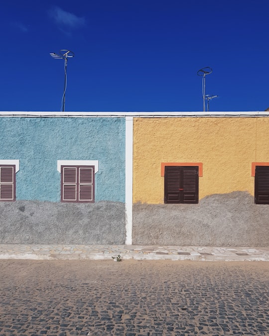 closed brown wooden windows in Santa Maria Cape Verde