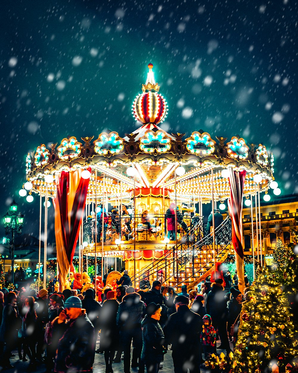 carousel with snow pouring down
