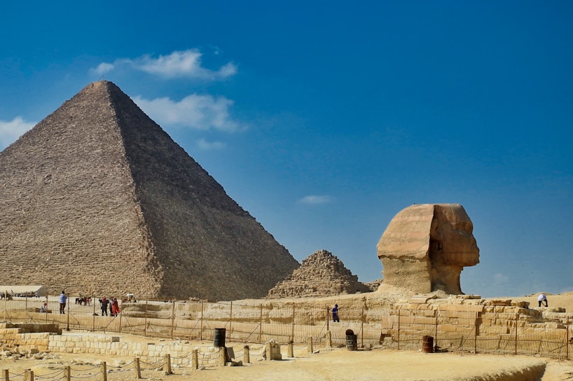 A stunning view of the Great Pyramid of Giza under a clear blue sky.
