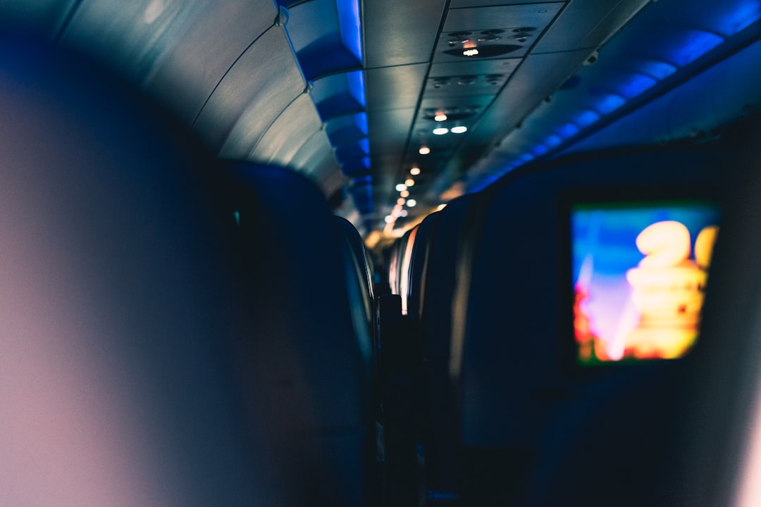 a view of the inside of an airplane with a television,