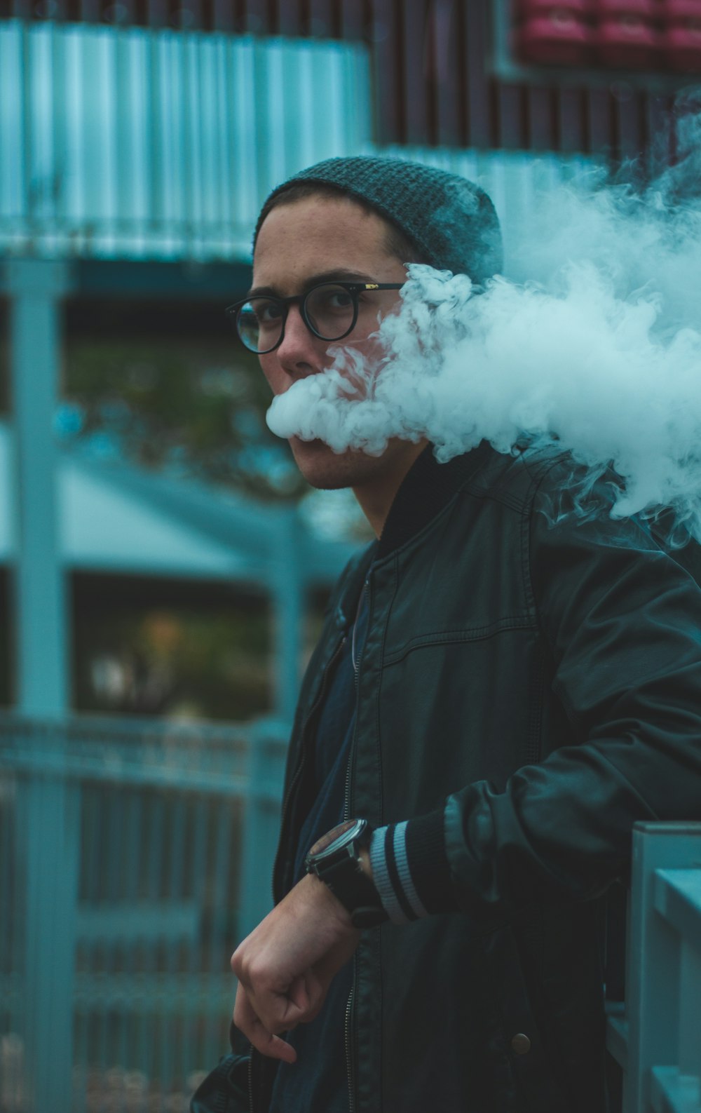 man vaping smoke