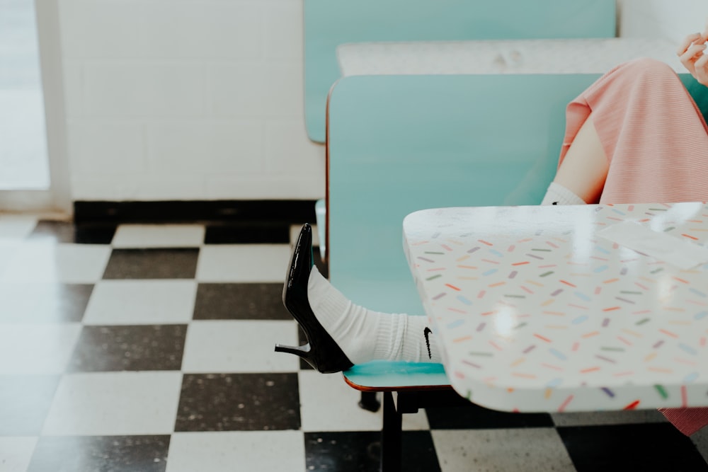 woman lying on chair