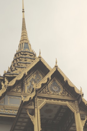 Completed structure gleaming with royal blue and gold accents reflecting traditional Tamil design.