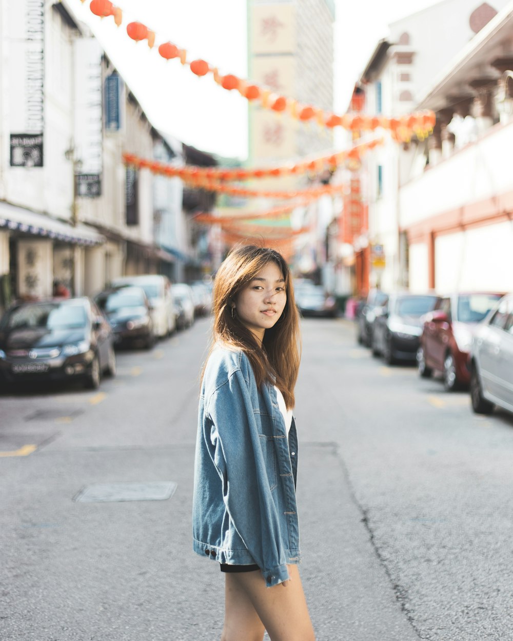 woman standing on road