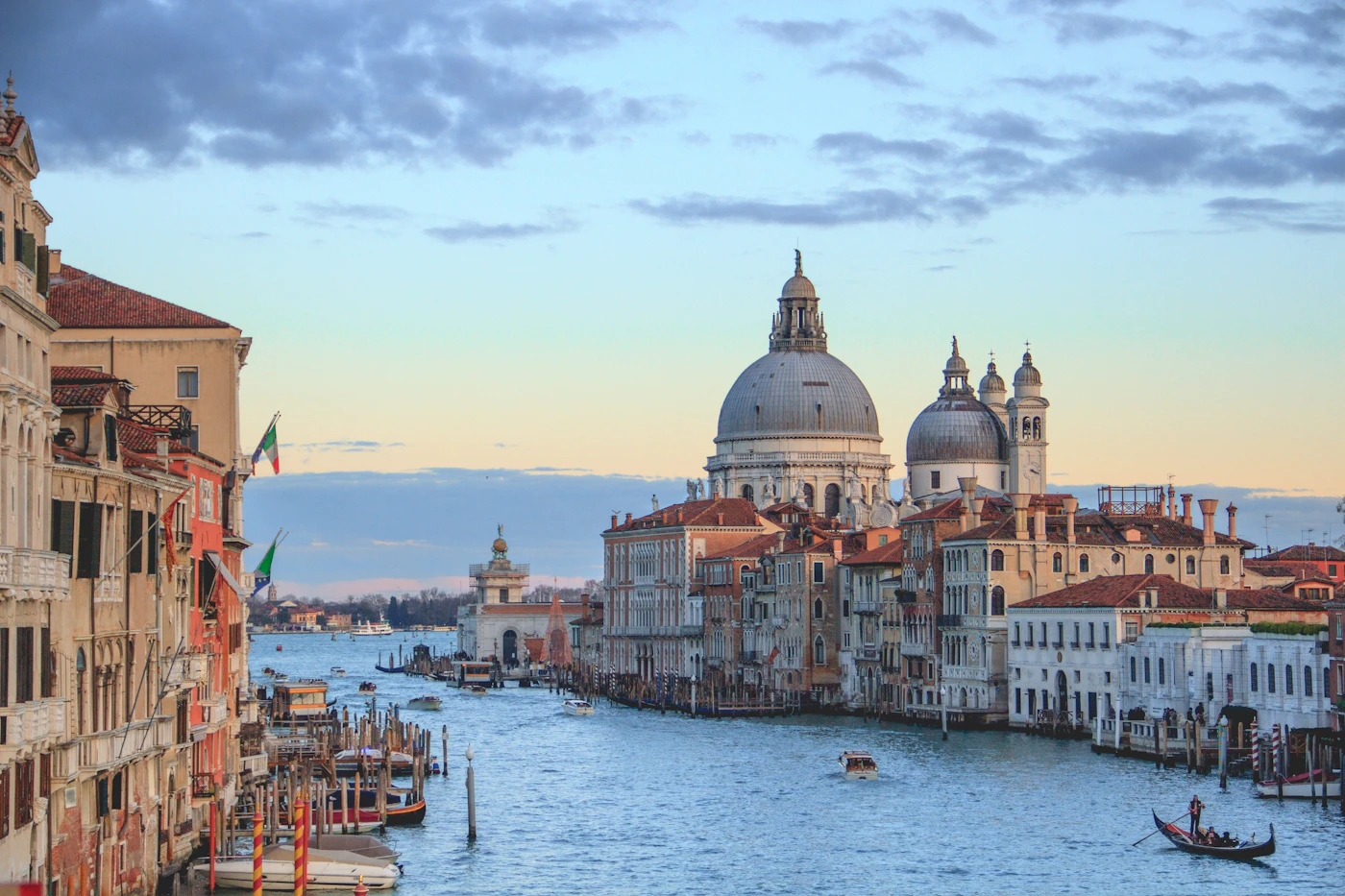 Venice canal at twilight with historic buildings