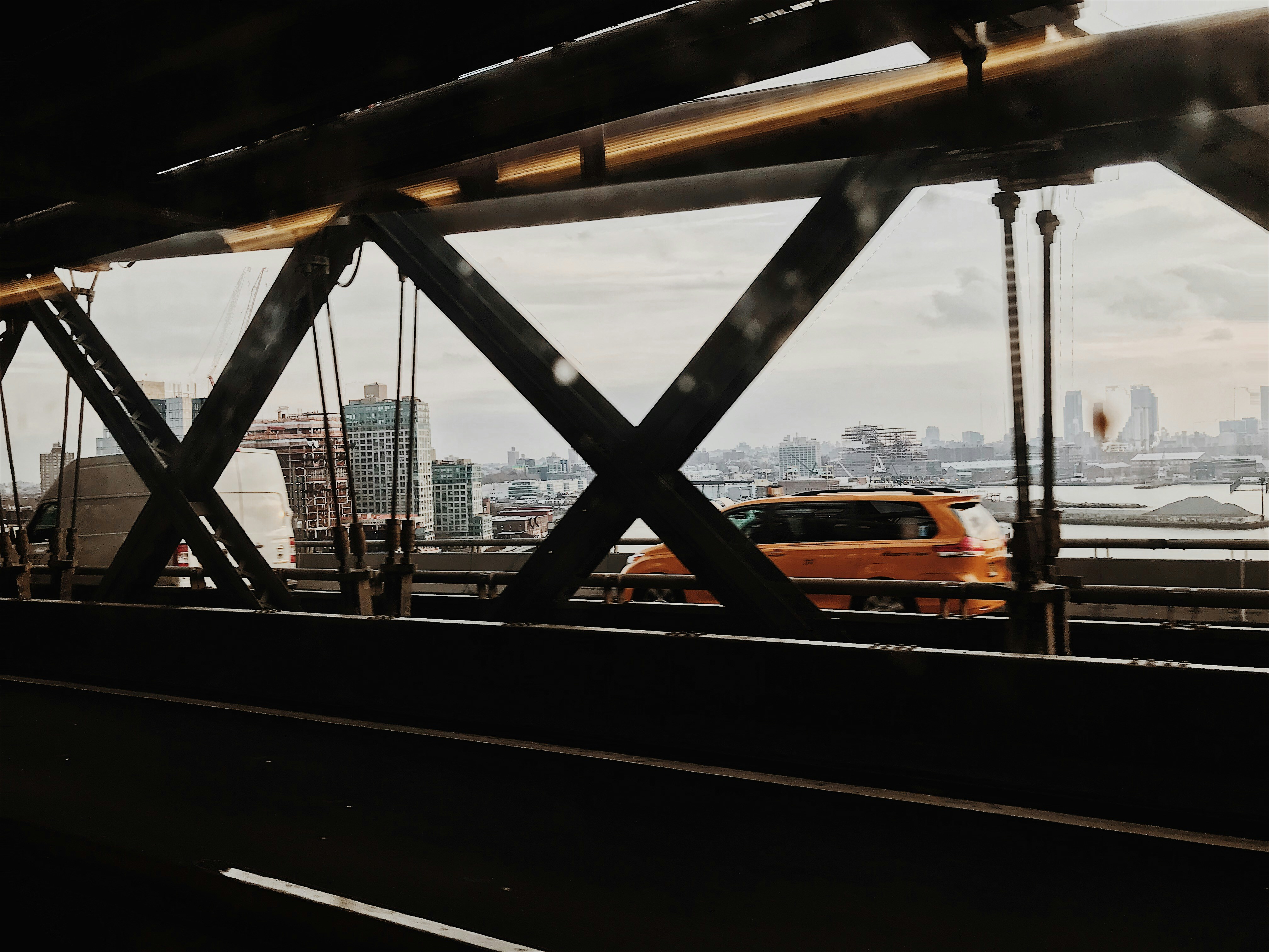 orange car on bidge