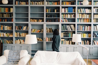 woman finding some book to read