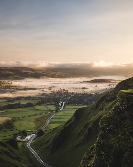 aerial view of houses near mountains during daytime in Winnats Pass United Kingdom