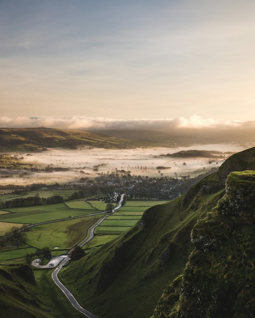 aerial view of houses near mountains during daytime