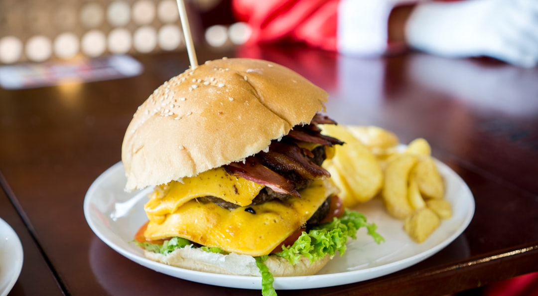 shallow focus photo of bacon and cheese burger