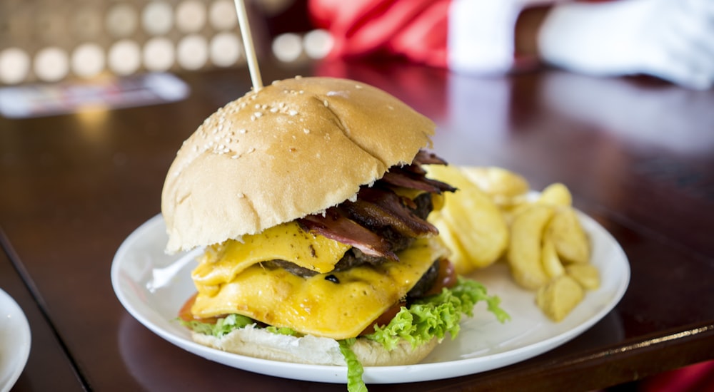 shallow focus photo of bacon and cheese burger