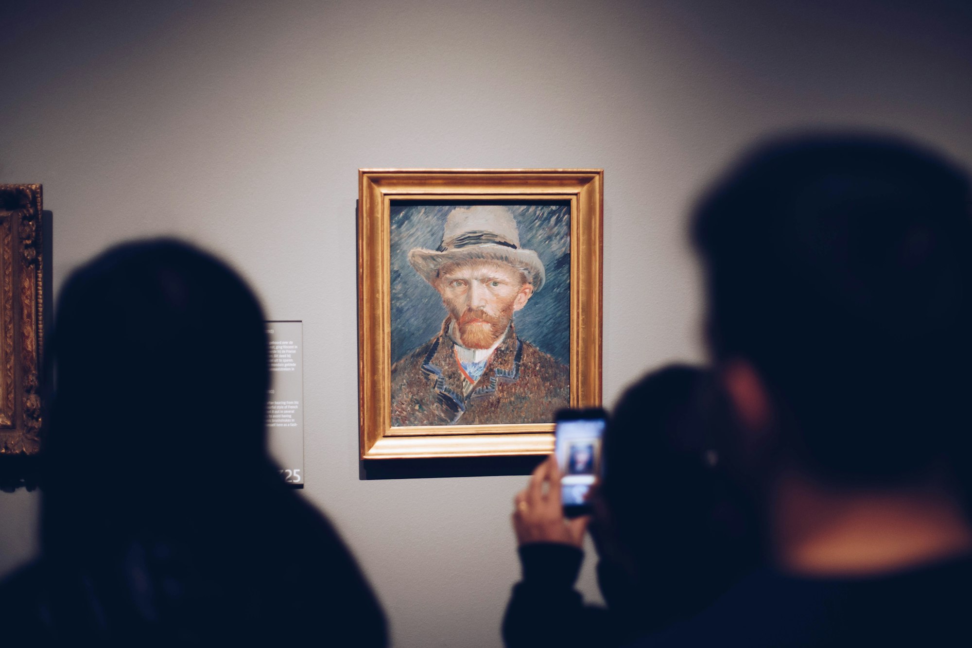 People passing by Vincent van Gogh’s self portrait and snapping a photo. More info at the Rijksmuseum’s website: https://www.rijksmuseum.nl/en/collection/SK-A-3262